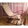 Wrought iron rocking chair
