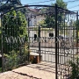 Arco di fiori in ferro battuto